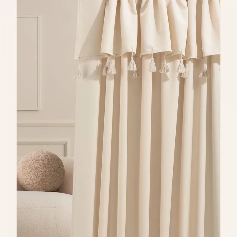 Produs nou | Perdea crem Astoria cu ciucuri pe o bandă de legare 140 x 250 cm